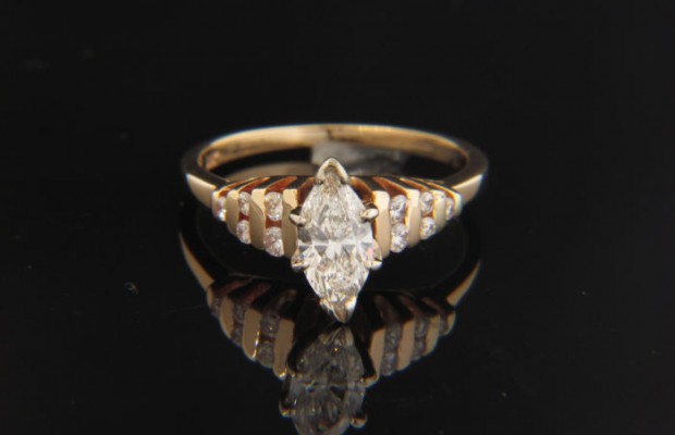 14k Gold Engagement Ring with Unique Bar Setting